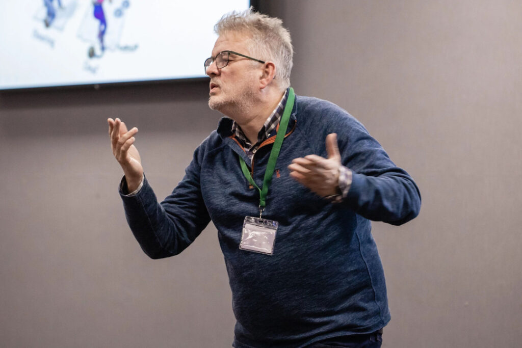 A man using British Sign Language